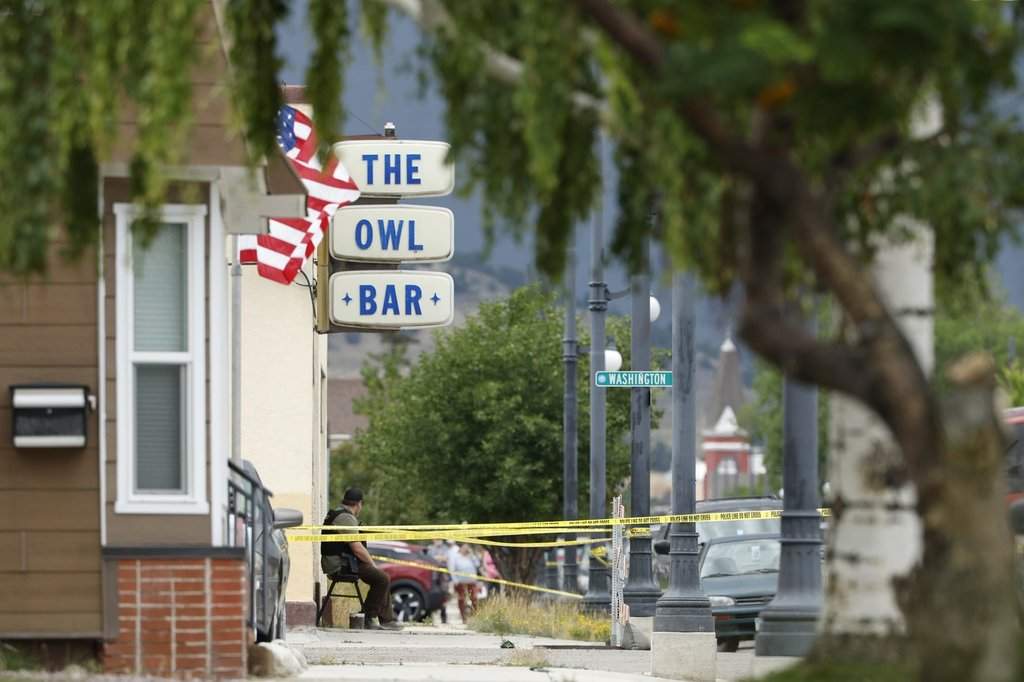 FILE - Police tape surrounds The Owl Bar in of Anaconda, Mont., on Friday, Aug. 1, 2025, following a fatal shooting. (Joseph Scheller/The Montana Standard via AP).
