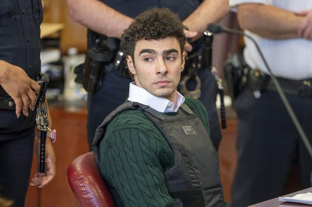 FILE - Luigi Mangione, accused of fatally shooting the UnitedHealthcare CEO Brian Thompson in New York City and leading authorities on a five-day search, appears in court for a hearing, Feb. 21, 2025, in New York.