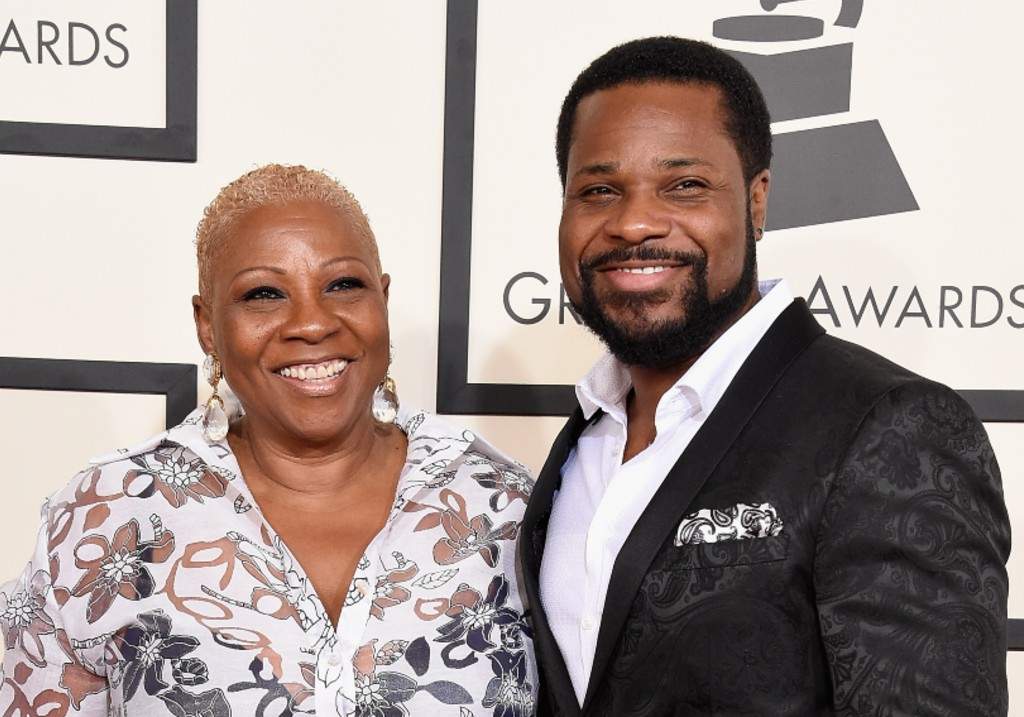 Actor Malcolm-Jamal Warner (R) and Pamela Warner attend The 57th Annual GRAMMY Awards at the STAPLES Center on February 8, 2015 in Los Angeles, California.