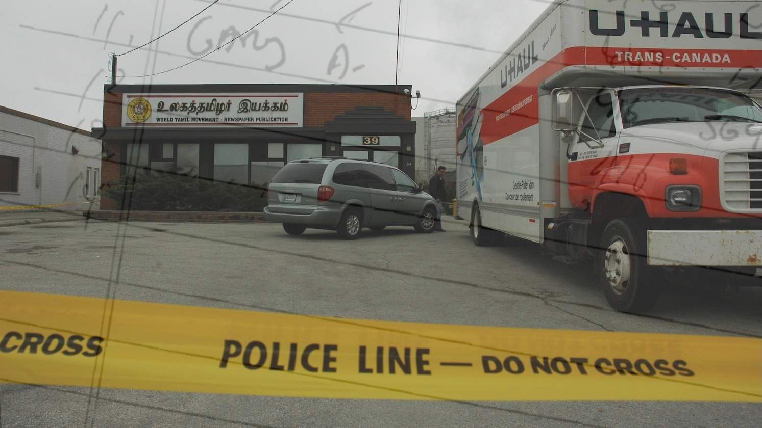 RCMP search the World Tamil Movement office in Toronto during a terror finance investigation, on April 22, 2006.