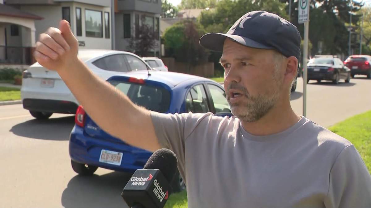 Michael MacDonald, who lives in Crescent Heights, said he was out walking when police drove up beside him and told him to "get out, get out."