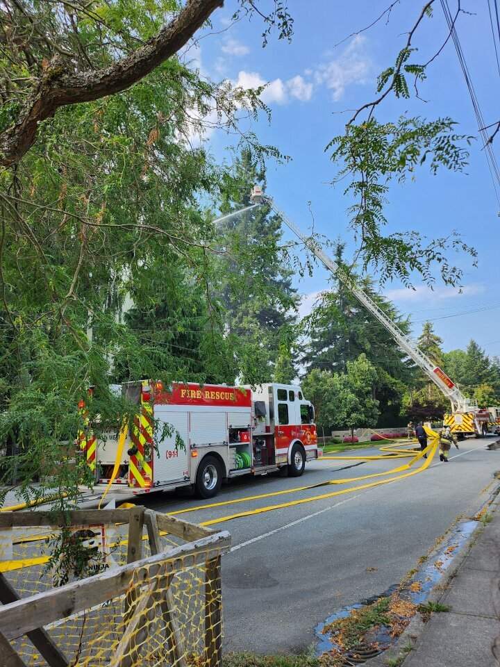 A firetruck and crews in the White Rock community.