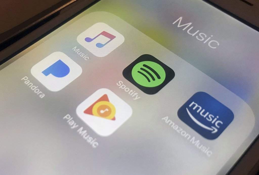 Music streaming apps appear on an iPhone on Jan. 28, 2018. 