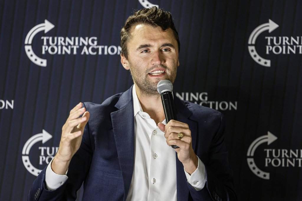 FILE - Charlie Kirk speaks during a town hall meeting on March 17, 2025, in Oconomowoc, Wis.