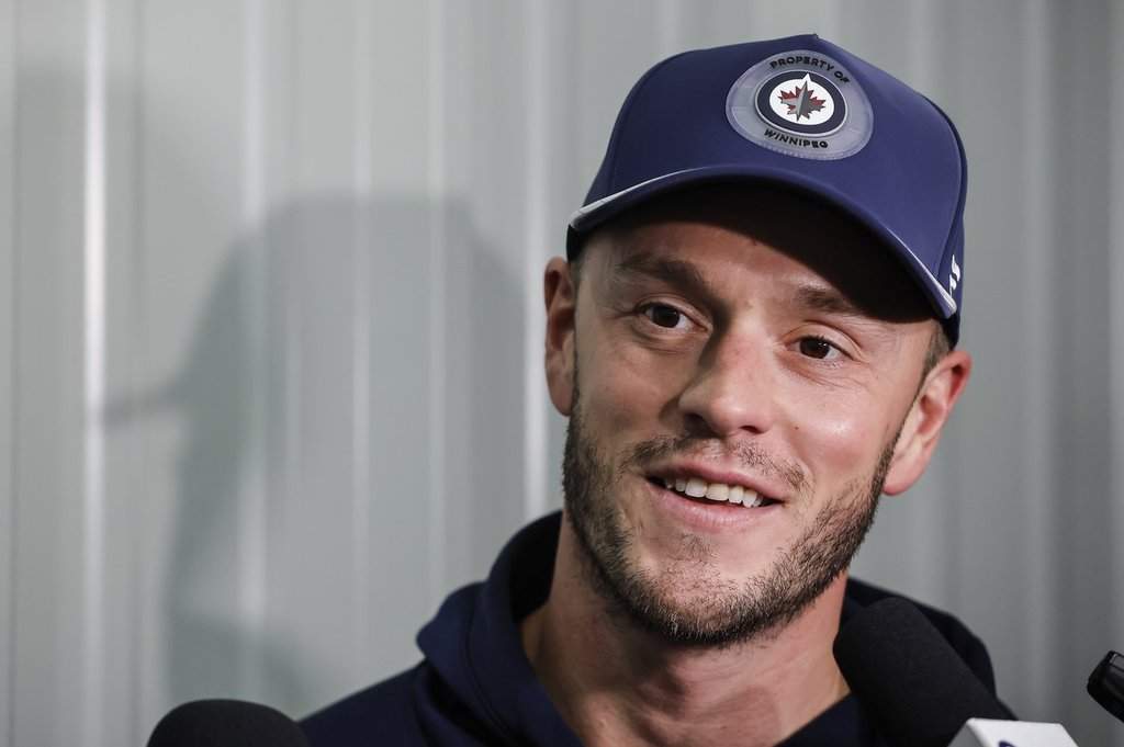 Winnipeg Jets’ Jonathan Toews (19) speaks to media after a pre-training camp practice in Winnipeg, Thursday, September 11, 2025. THE CANADIAN PRESS/John Woods