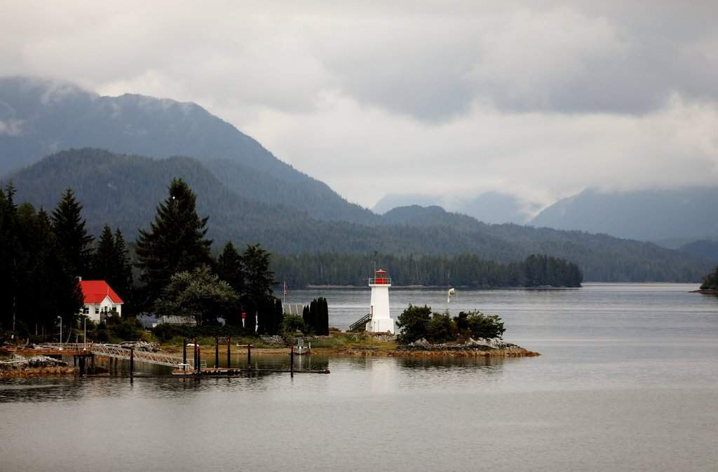 A view of a lighthouse on the Inside Passage from aboard the B.C. Ferries "Northern Expedition" between Port Hardy on Vancouver Island and Prince Rupert, B.C., on Thursday Aug. 30, 2018. THE CANADIAN PRESS/Colin Perkel.