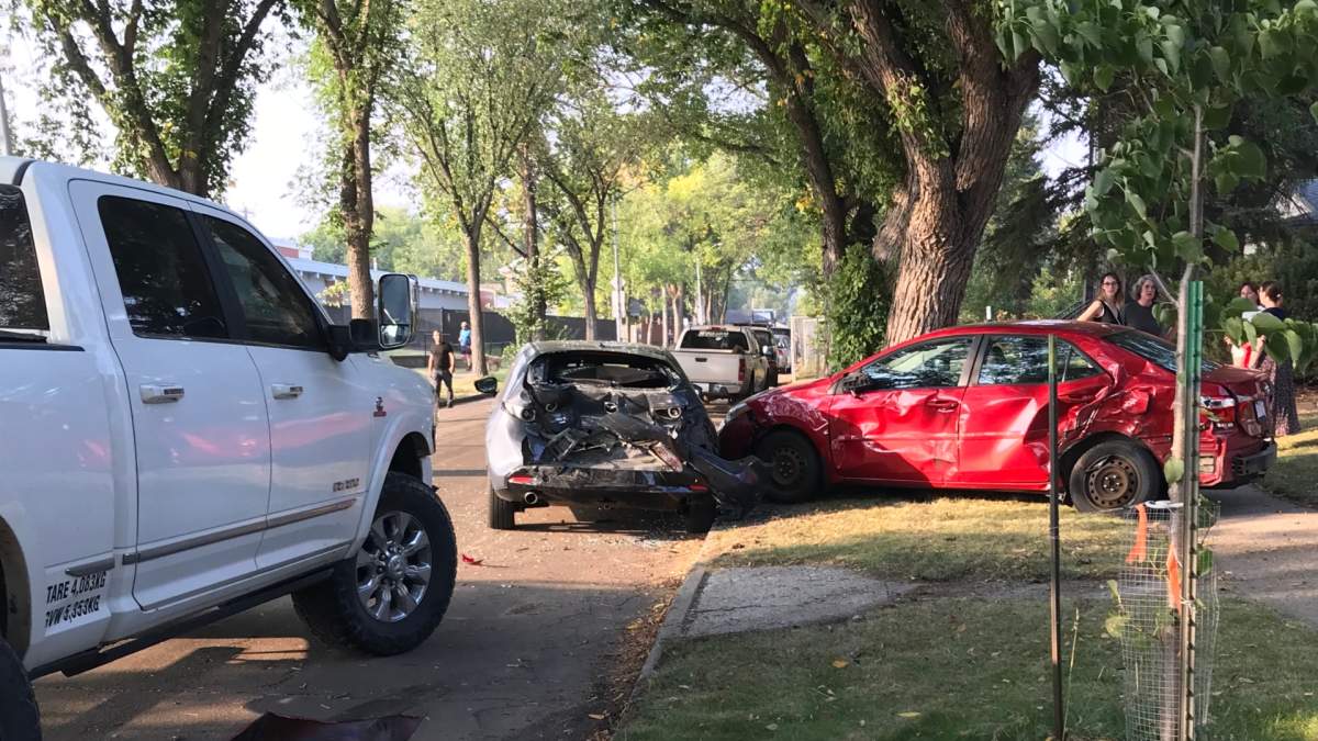 A truck smashed two cars in Edmonton's Forest Heights neighbourhood on Tuesday, Sept. 9, 2025.