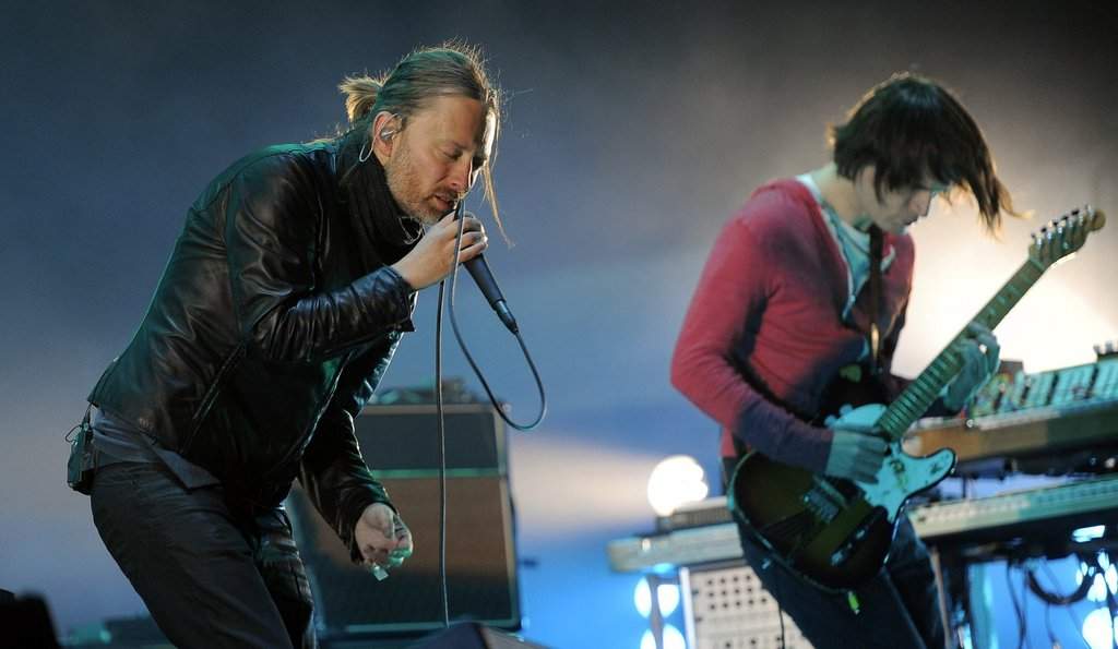 FILE - In this April 14, 2012 file photo, Thom Yorke, left, and Jonny Greenwood of Radiohead perform during the band's headlining set at the 2012 Coachella Valley Music and Arts Festival in Indio, Calif.