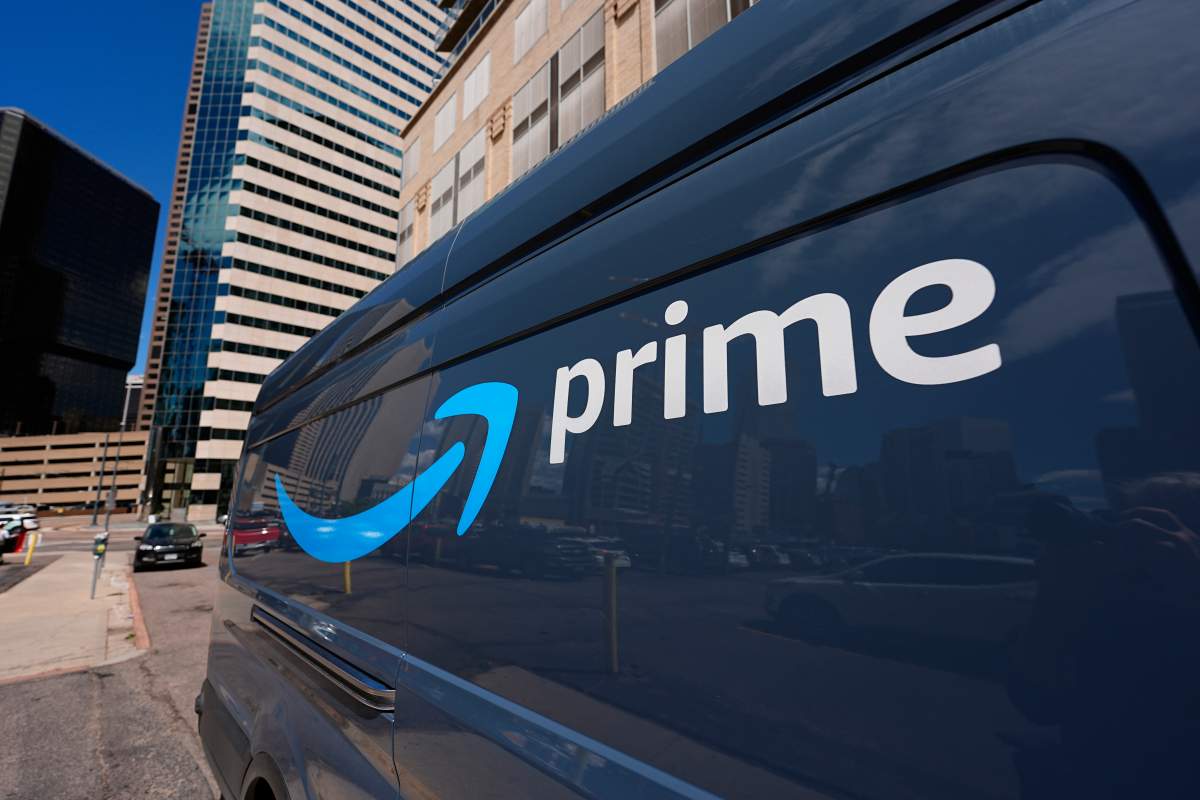 The logo adorns the side of an Amazon delivery van Tuesday, May 14, 2024, in downtown Denver.