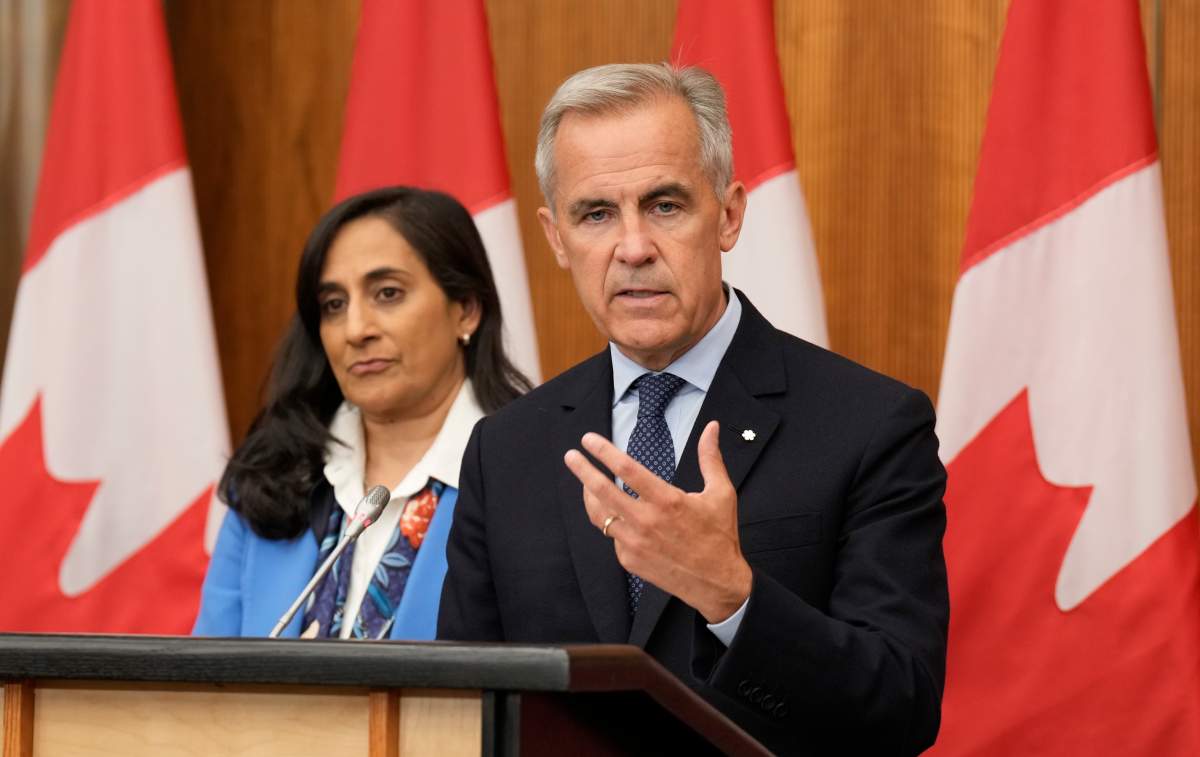 FILE - Prime Minister Mark Carney speaks with media during a news conference in Ottawa, Wednesday, July 30, 2025. THE CANADIAN PRESS/Adrian Wyld.