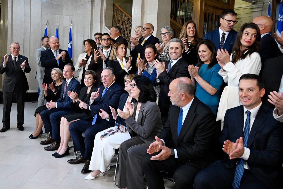 Quebec Premier Francois Legault, centre, poses with his new cabinet after a cabinet shuffle in Quebec City, Wednesday, Sept. 10, 2025. THE CANADIAN PRESS/Jacques Boissinot