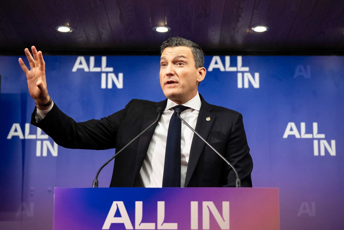 Minister of Artificial Intelligence and Digital Innovation Evan Solomon takes part in a press conference at the All In AI conference in Montreal on Wednesday, Sept. 24, 2025.