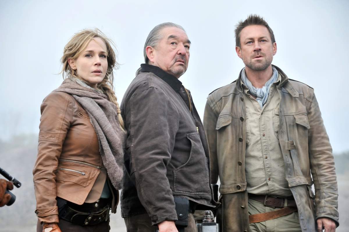 Defiance -- Pilot -- Pictured: (l-r) Julie Benz as Amanda Rosewater, Graham Greene as Rafe McCawley, Grant Bowler as Jeb Nolan.