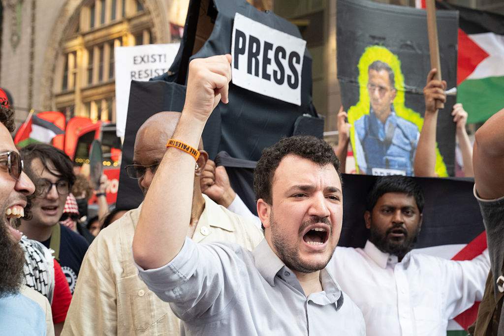 Mahmoud Khalil, former Columbia University graduate student known for his role in the 2024 Columbia University pro-Palestinian protests, leads a Pro-Palestinian "March for Humanity" against the humanitarian crisis in Gaza on August 16, 2025 in New York City.