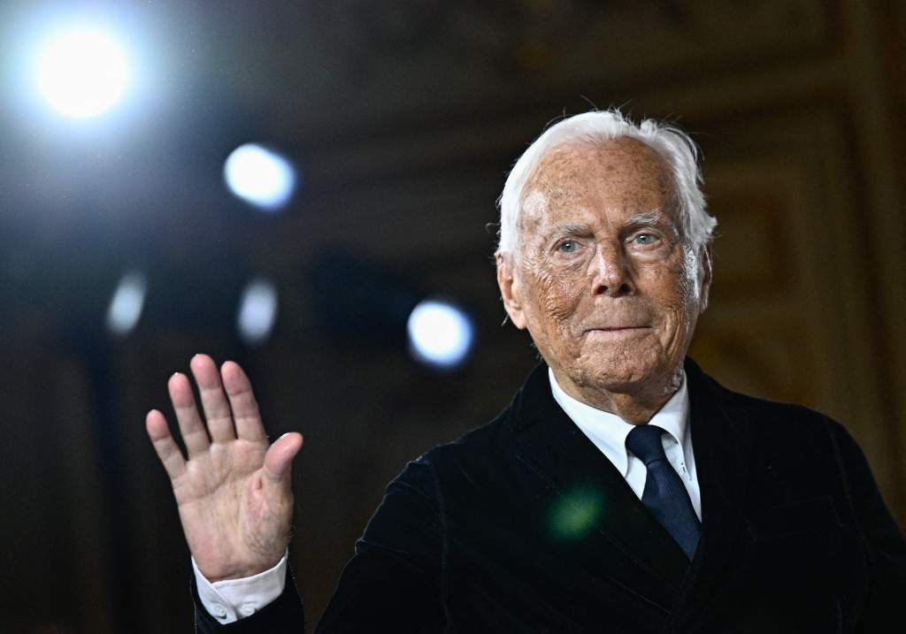 Italian designer Giorgio Armani acknowledges the applause at the end of his presentation for Armani Prive during the Women's Haute-Couture Spring/Summer 2025 Fashion Week to mark its 20th anniversary, in Paris on January 28, 2025.