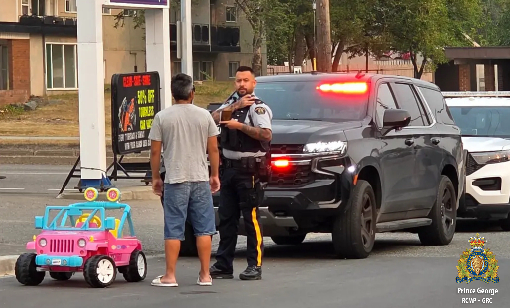 A man was caught riding a pink toy jeep down a road in Prince George on Friday morning during the commute.