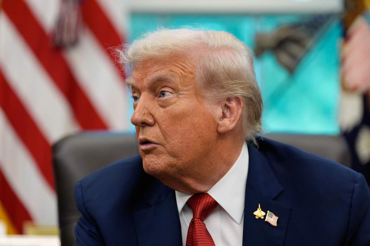 U.S. President Donald Trump speaks to reporters after signing an executive order regarding TikTok in the Oval Office at the White House, Thursday, Sept. 25, 2025, in Washington.