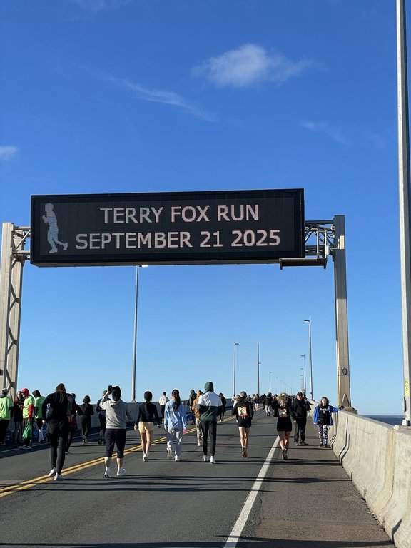 Some of the approximately 10,000 runners in attendance are seen running across the Conferdation Bridge for the 45th annual Terry Fox Run in a Sunday, Sept. 21, 2025, handout photo. THE CANADIAN PRESS/Handout - Terry Fox Foundation (Mandatory Credit).