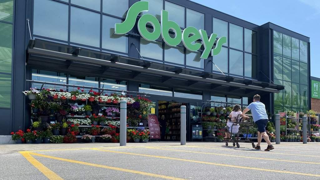 Shoppers at a west-end Toronto Sobeys grocery store, Sunday, June 26, 2023. Empire Co. Ltd. says its first-quarter profit and sales rose compared with a year ago. THE CANADIAN PRESS/Graeme Roy.