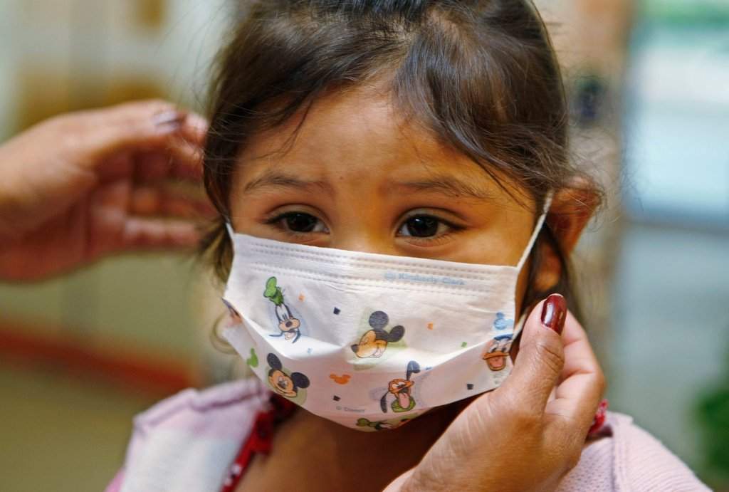 FILE - Lucile Packard Children's Hospital at Stanford visitor Sheila Garcia, 3, wears before visiting a patient at the hospital in Palo Alto, Calif., Oct. 19, 2009. (AP Photo/Paul Sakuma, File).