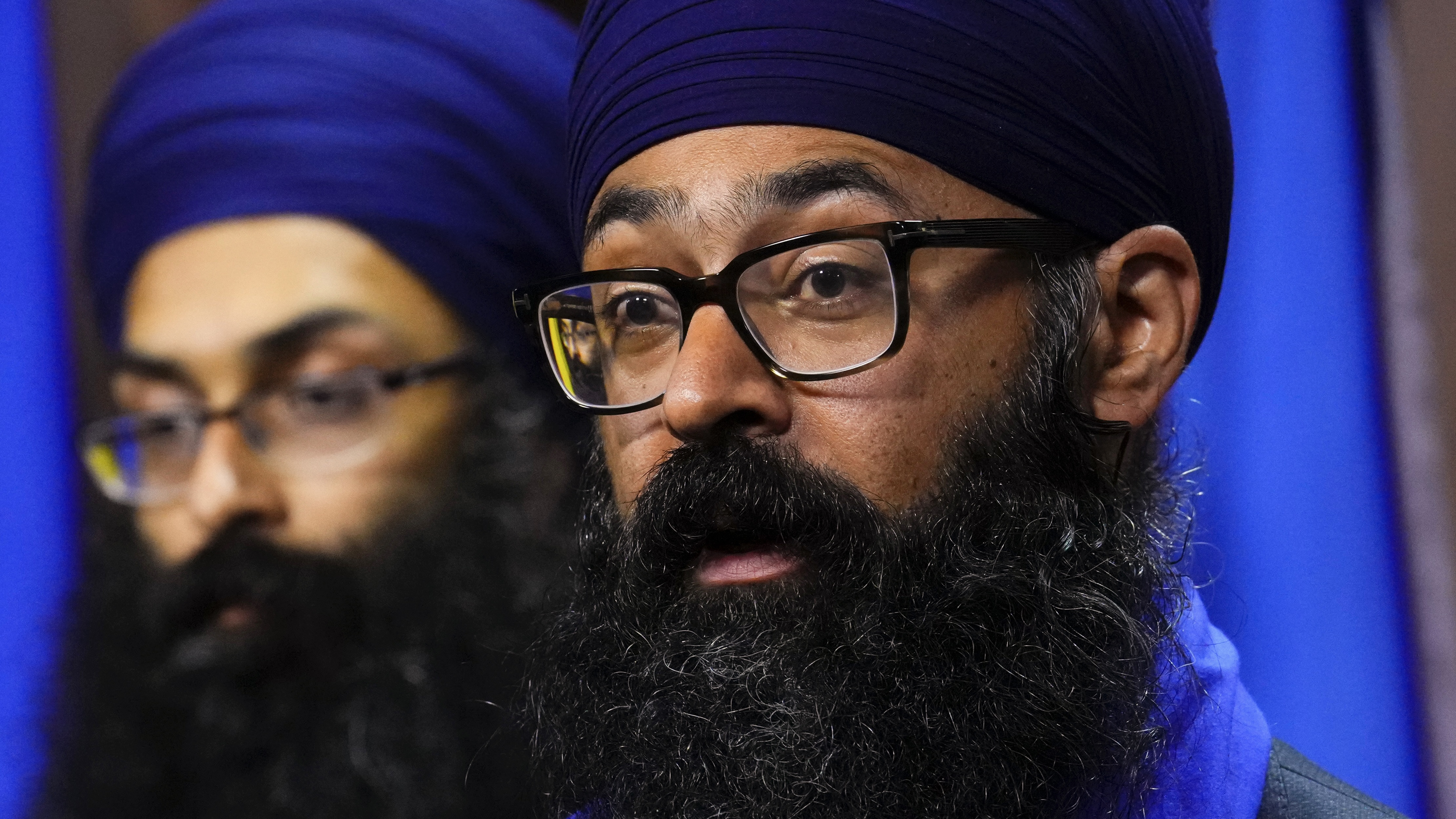 Moninder Singh, of the Sikh Federation Canada, right, on Parliament Hill, June 12, 2025. 