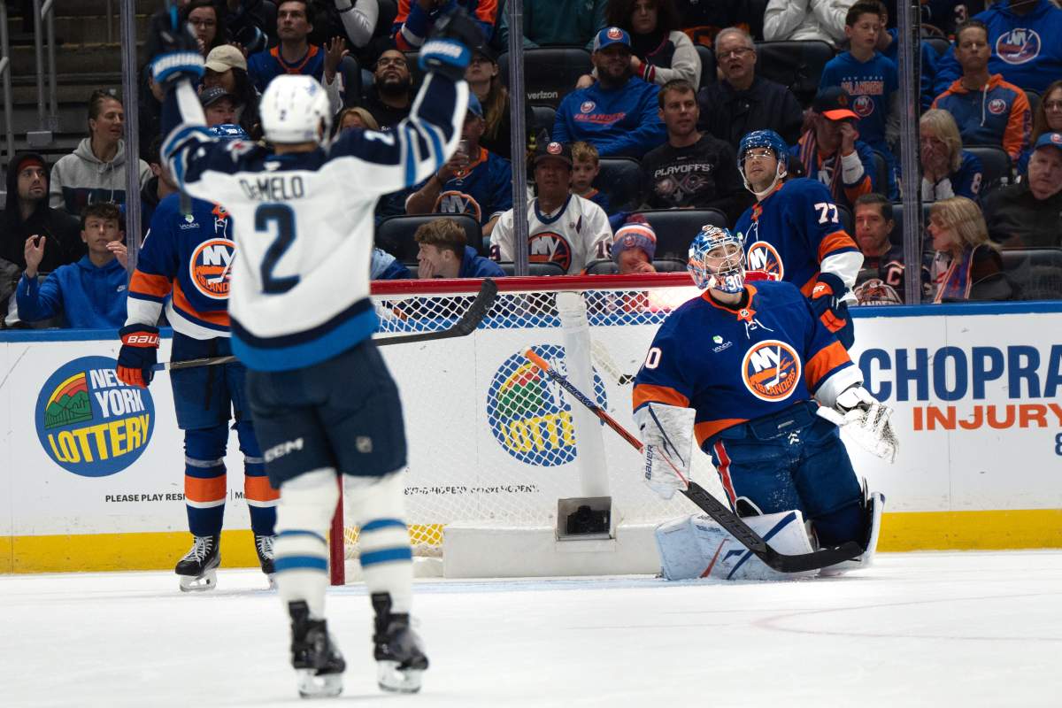 New York Islanders goaltender Ilya Sorokin (30) reacts after Winnipeg Jets left wing Tanner Pearson scored against him, the Jets' fourth goal in the game, during the second period of a hockey game, Monday, Oct. 13, 2025, in Elmont, N.Y. (AP Photo/Angelina Katsanis).