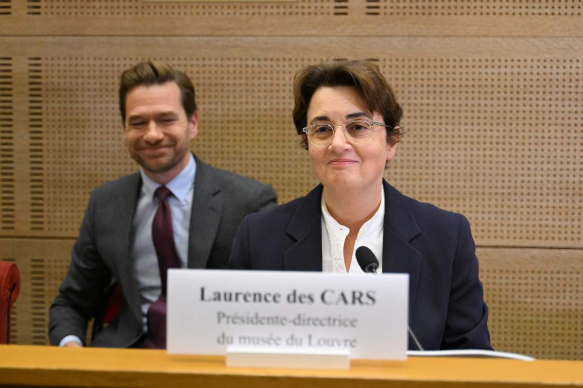 Laurence des Cars, director of Le Louvre museum, poses before a hearing at the Culture commission of the Senate, three days after historic jewels were stolen in a daring daylight heist, Wednesday, Oct. 22, 2025 in Paris.