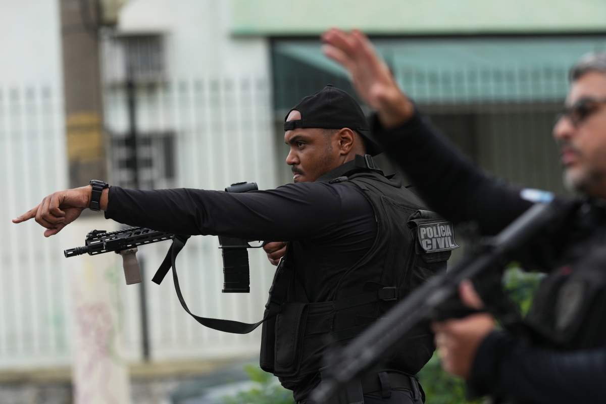 Police conduct an operation against alleged drug traffickers in the Complexo do Alemao favela where the criminal organization "Comando Vermelho" operates in Rio de Janeiro, Tuesday, Oct. 28, 2025.