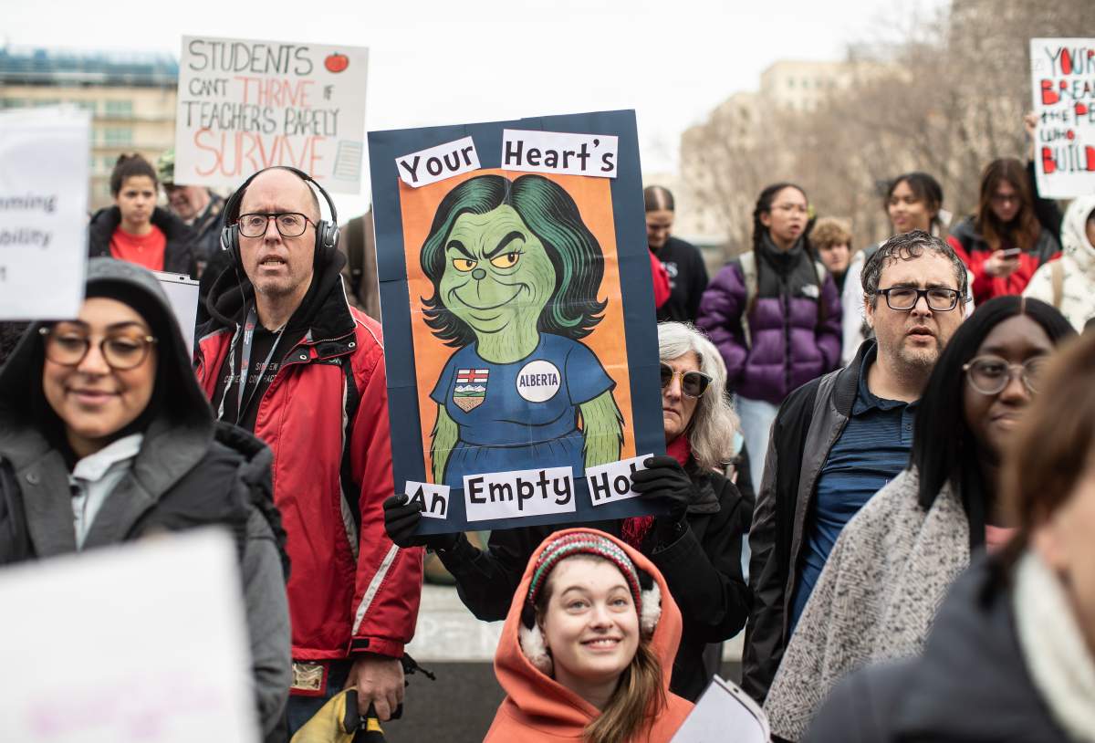 Students and supporters rally at the Alberta legislature to protest the province’s decision to order striking teachers back to work, in Edmonton on Thursday, Oct. 30, 2025.