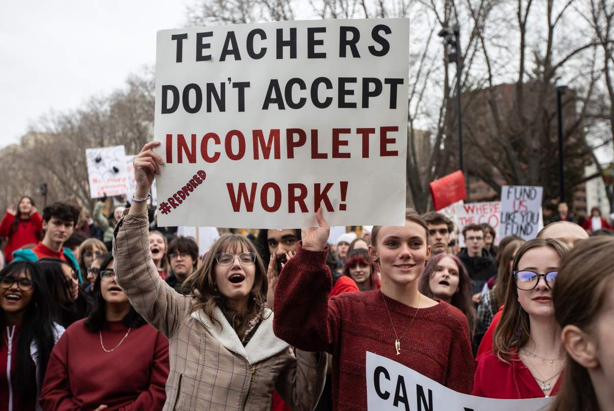 Students and supporters rally at the Alberta legislature to protest the province’s decision to order striking teachers back to work, in Edmonton on Oct. 30, 2025. THE CANADIAN PRESS/Jason Franson.