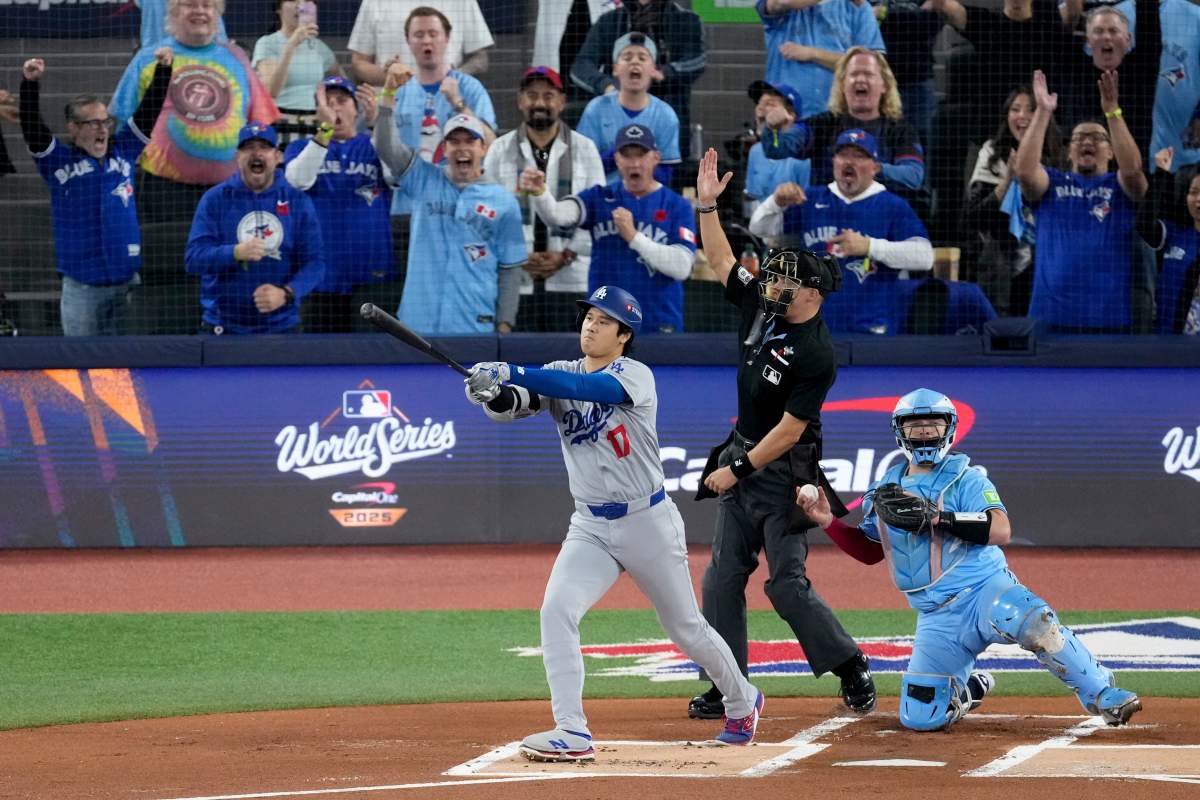 Los Angeles Dodgers’ Shohei Ohtani strikes out swinging against the Toronto Blue Jays during the first inning in Game 6 of baseball’s World Series, Friday, Oct. 31, 2025, in Toronto.