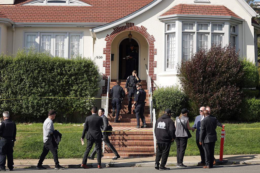 San Francisco Police officers at scene at 930 Monterey Blvd. in San Francisco, where four people were found dead on Wednesday, October 8, 2025.