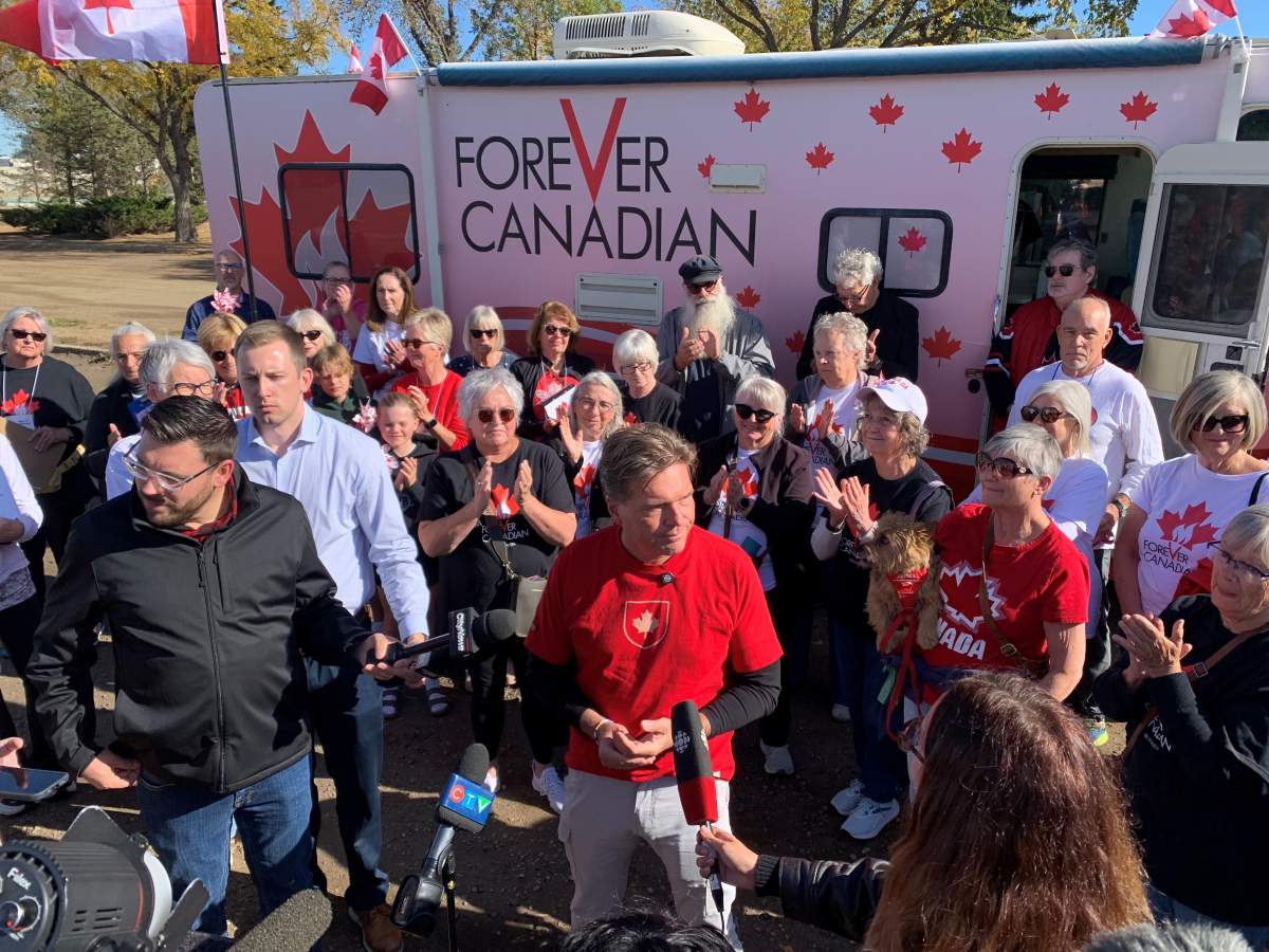 Former Alberta deputy premier Thomas Lukaszuk surrounded by supporters of his Forever Canadian petition, which aims to make it official policy for Alberta to stay in the country. Oct. 3. 2025.