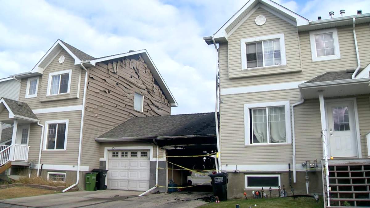 Townhomes near 25 Avenue and 24 Street in southeast Edmonton's Silver Berry neighbourhood were damaged in a fire on Monday, Oct. 20, 2025.