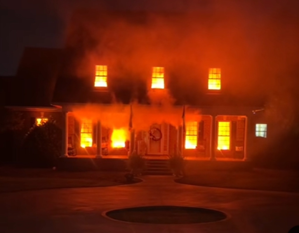 Sam Lee and Amanda Riggins Peden's Halloween decorations mimicking a house fire.