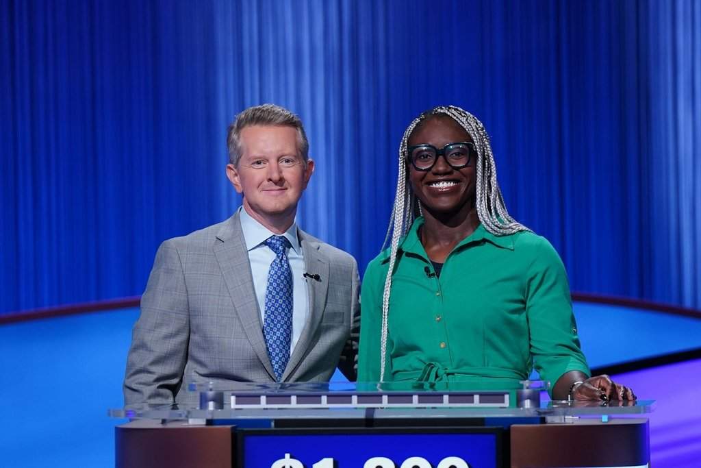 Canadian bobsledder and trivia enthusiast Cynthia Appiah has achieved a lifelong dream — appearing on the TV show “Jeopardy.” Appiah, right, is seen in this handout photo with host Ken Jennings.
