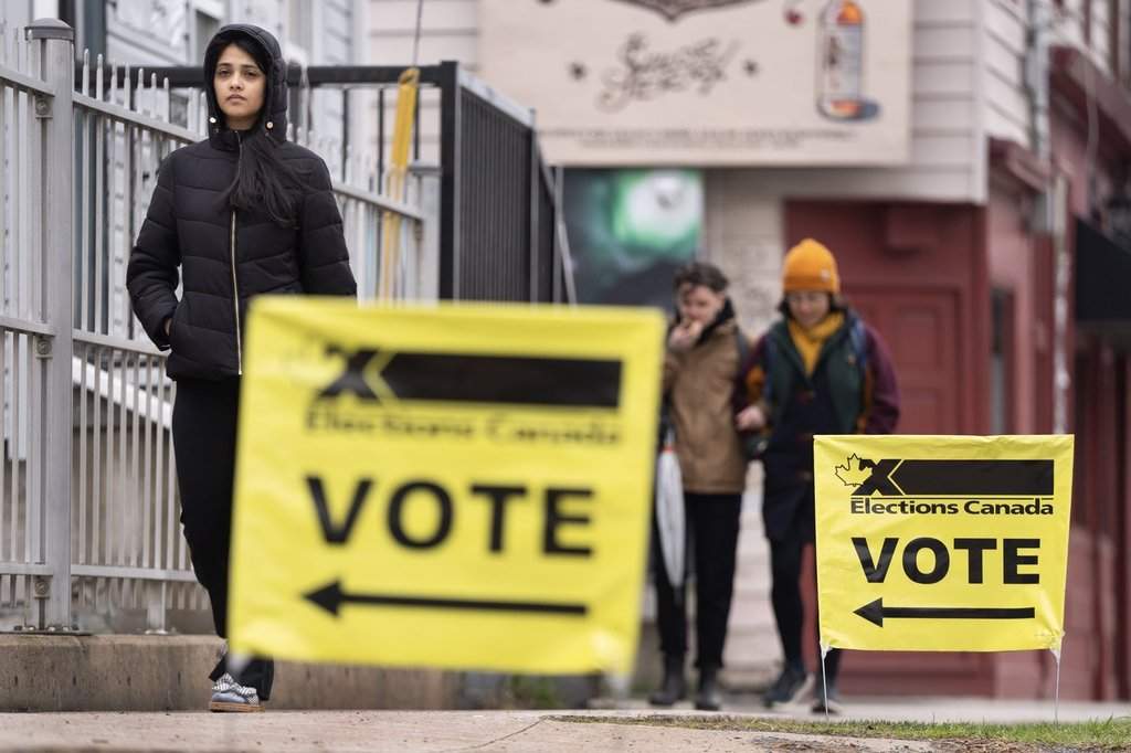 Voters arrive at a polling station on election day in Halifax on Monday, April 28, 2025. THE CANADIAN PRESS/Darren Calabrese.