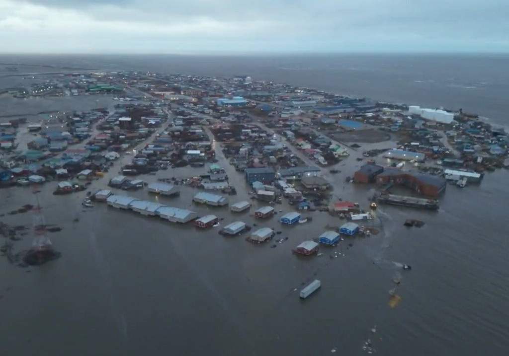 In this aerial photo provided by the Alaska Department of Transportation and Public Facilities, the city of Kotzebue, Alaska experiences flooding, Wednesday, Oct. 8, 2025.
