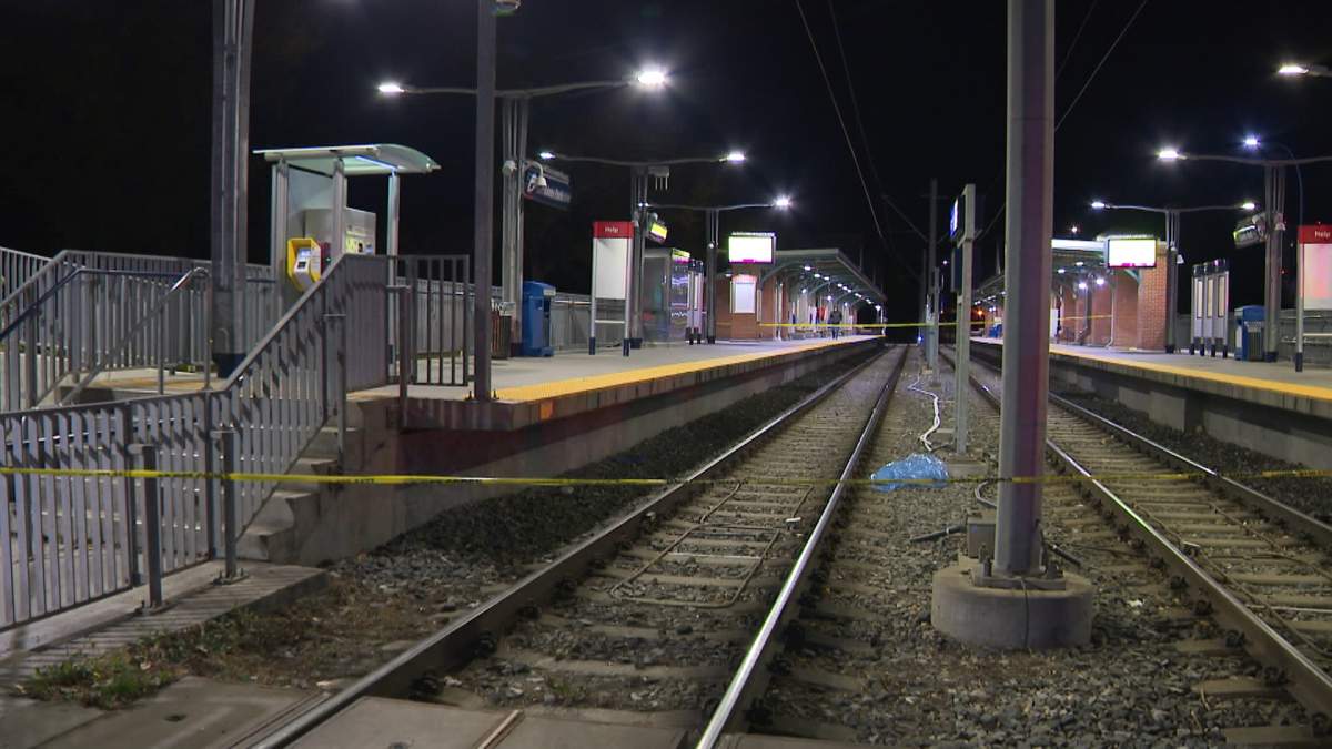 The Lions Park CTrain station is seen surrounded by police tape early Monday morning after a man was seriously injured when he fell between two of the cars on an outbound train.