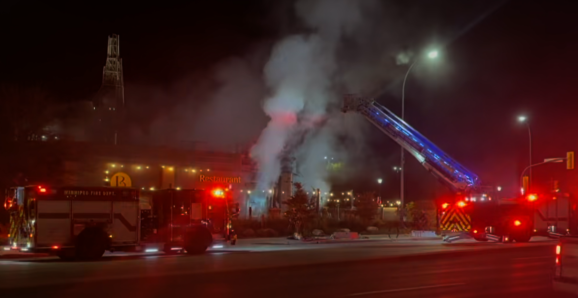 Winnipeg firefighters at the scene of a restaurant fire early on the morning of Oct. 23, 2025, at Main Street and York Avenue.