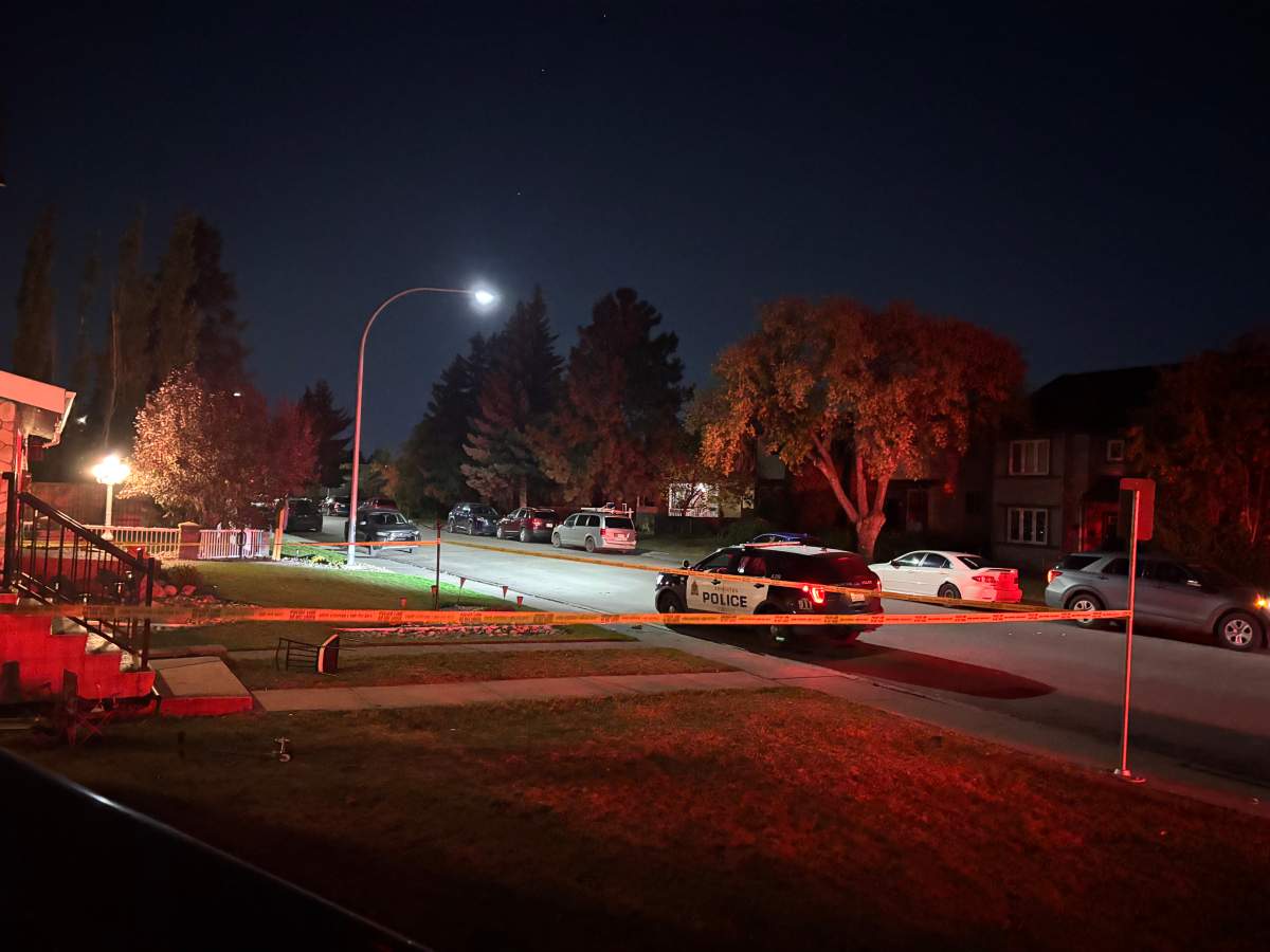 Police tape outside a duplex in Canora.