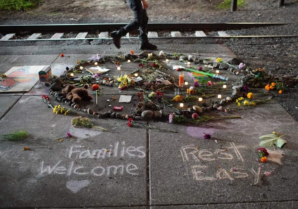 Outside the Portland ICE facility messages and items are left as people protest immigration detention, Saturday, Sept. 27, 2025, in Portland, Ore.