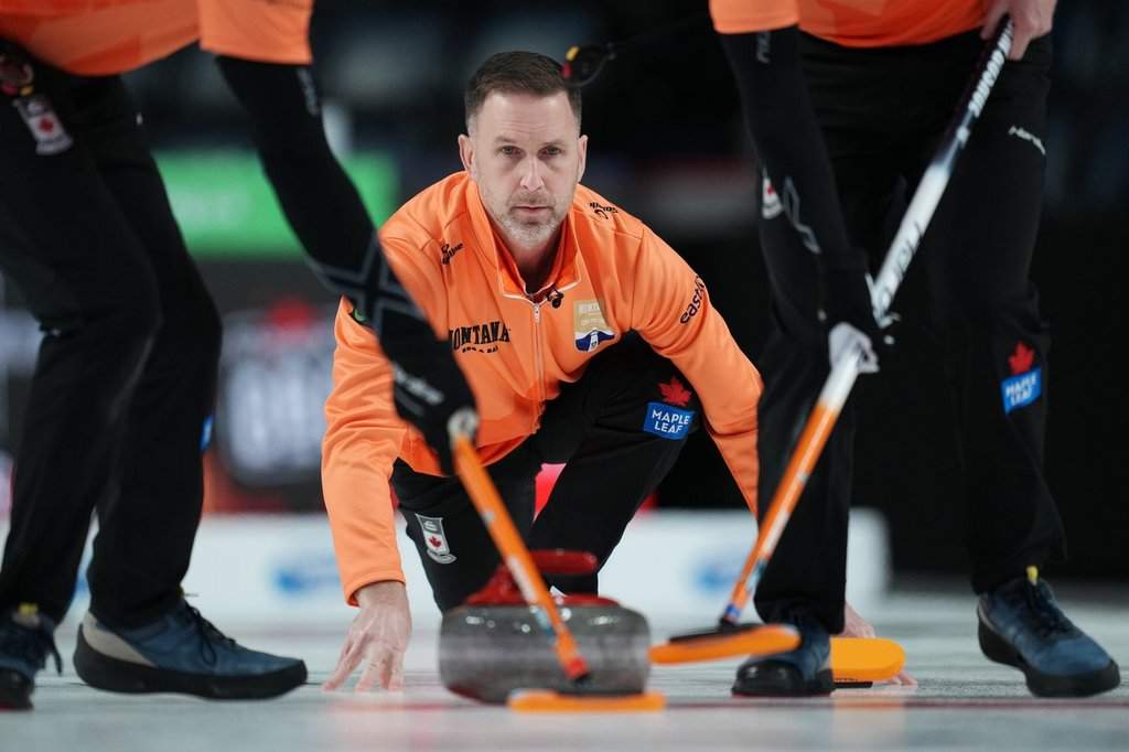 Brad Gushue throws a rock against Team Epping during Canadian Olympic curling trials action in Halifax, Monday, Nov. 24, 2025. THE CANADIAN PRESS/Darren Calabrese.