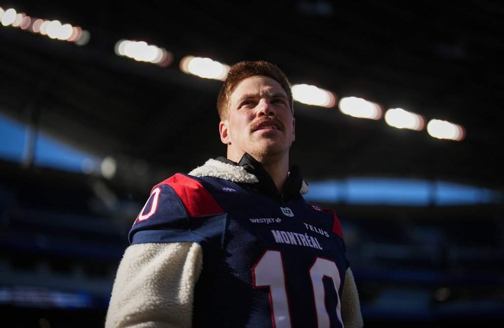 Montreal Alouettes quarterback Davis Alexander walks on the field during a walkthrough ahead of the 112th CFL Grey Cup, in Winnipeg, on Saturday, November 15, 2025. THE CANADIAN PRESS/Darryl Dyck.