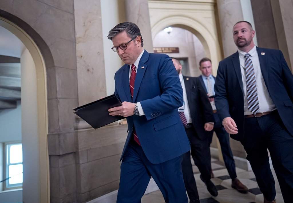 Speaker of the House Mike Johnson, R-La., heads from his office to the chamber for the final vote to bring the longest government shutdown in history to an end, at the Capitol in Washington, Wednesday, Nov. 12, 2025.