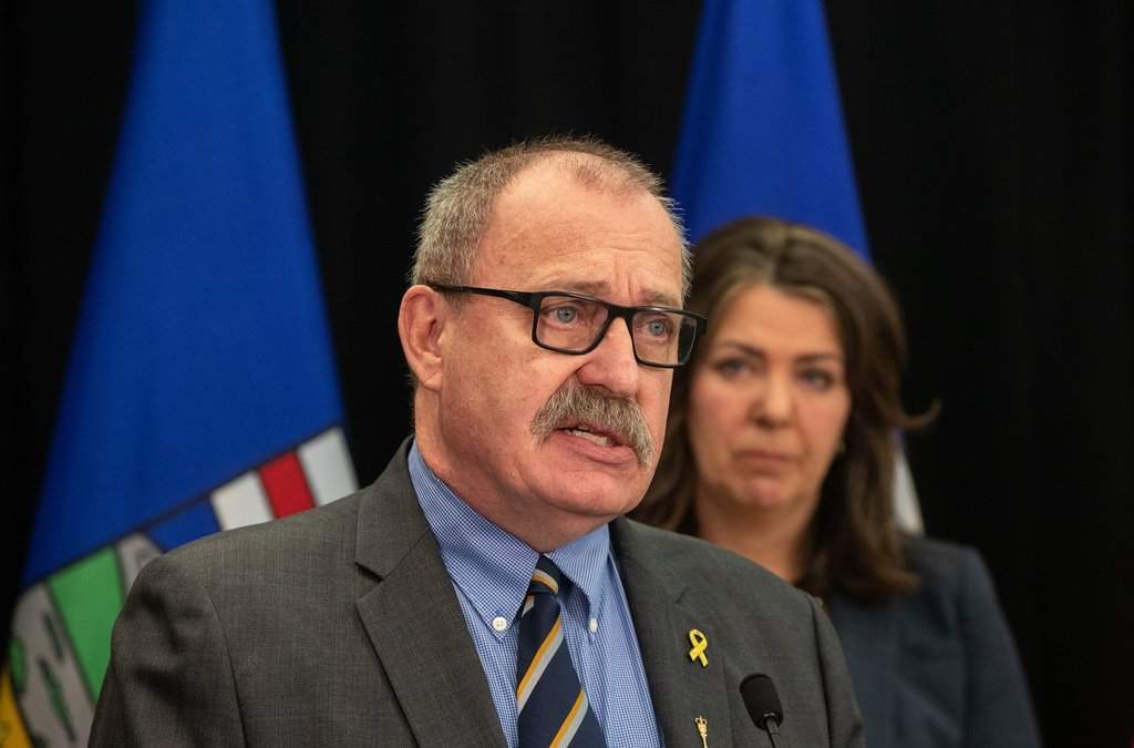 Former minister of Municipal Affairs Ric McIver and Alberta Premier Danielle Smith introduce legislation addressing agreements between the federal government and provincial entities in Edmonton on Wednesday, April 10, 2024. on.