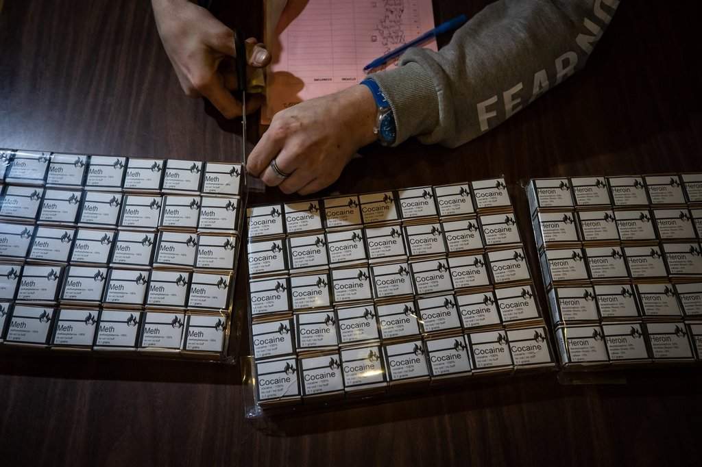 A tested supply of cocaine, heroin and methamphetamine is readied for distribution to drug users after a gathering to remember those who died from a suspected illicit drug overdose, in Vancouver, on Wednesday, February 9, 2022. The Drug User Liberation Front (DULF), Vancouver Area Network of Drug Users (VANDU) and B.C. Association of People on Opiate Maintenance distributed a tested supply of illicit drugs to users after the gathering in a call for a safer drug supply. THE CANADIAN PRESS/Darryl Dyck.