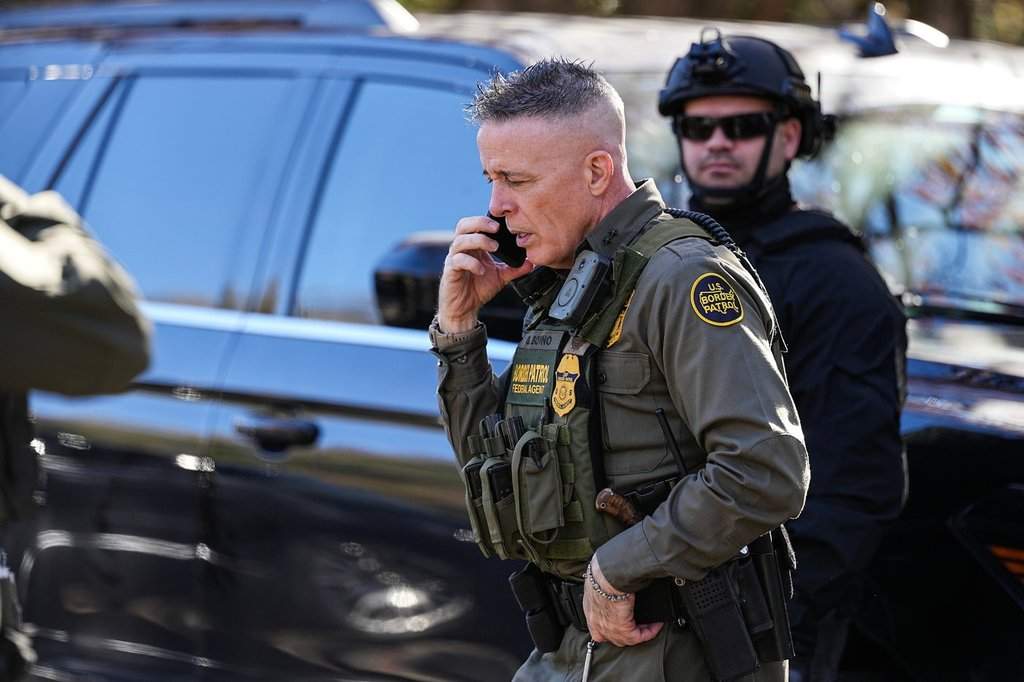 U.S. Border Patrol Commander at large Gregory Bovino takes a phone call, Monday, Nov. 17, 2025, in Charlotte, N.C.