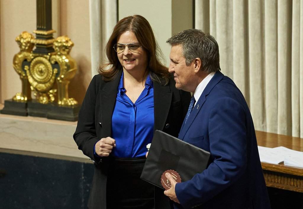 Manitoba Premier Heather Stefanson and Finance Minister Cliff Cullen chat before Cullen delivers the 2023 budget in the Manitoba Legislative Building, in Winnipeg on Tuesday, March 7, 2023. THE CANADIAN PRESS / David Lipnowski.