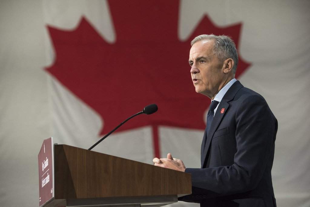 FILE - Prime Minister Mark Carney makes an announcement at the manufacturing facility of Maple Leaf Homes in Fredericton, N.B., on Monday, Nov. 10, 2025. THE CANADIAN PRESS/Stephen MacGillivray.